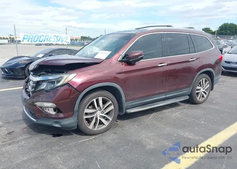 2017 Honda Pilot Touring z USA, uszkodzony, nr VIN 5FNYF5H95HB029847